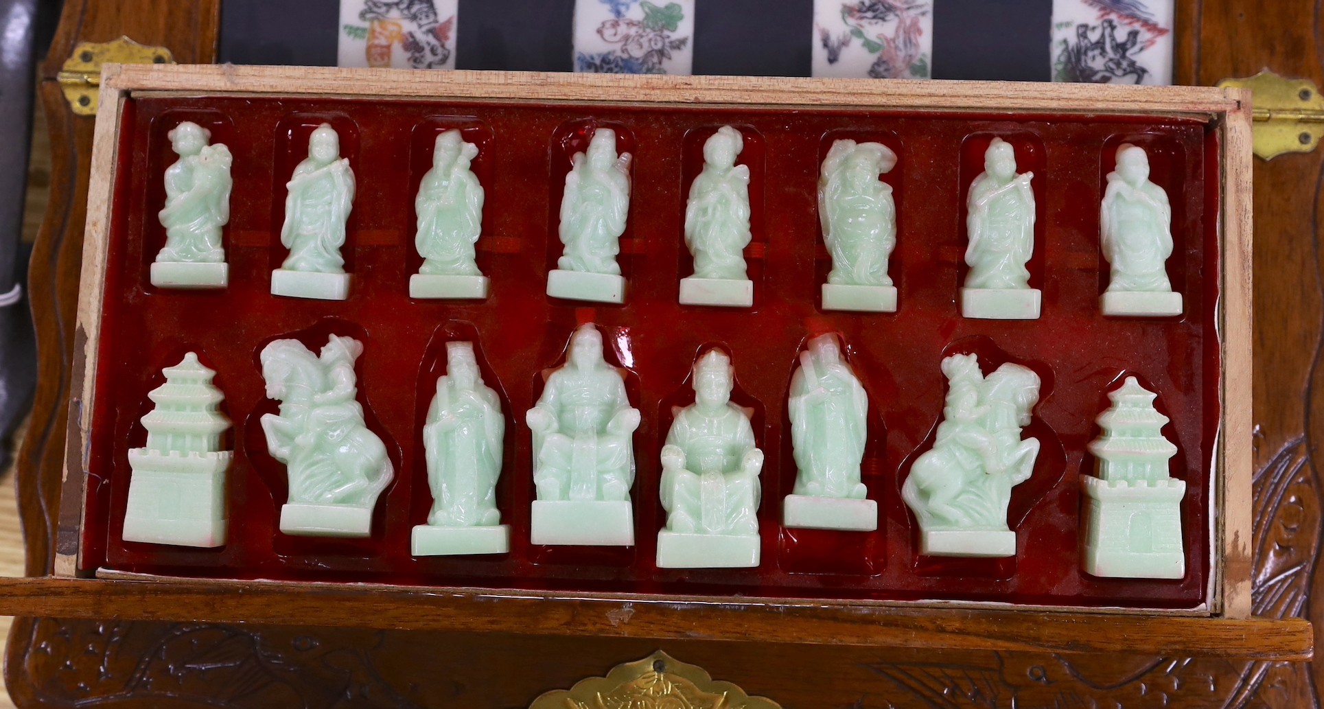 A Chinese chess set with resin pieces, 39x39cm